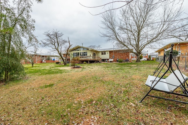 view of yard with a deck