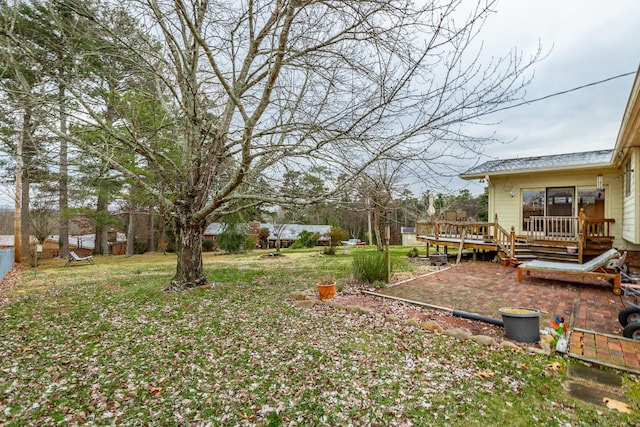 view of yard with a deck