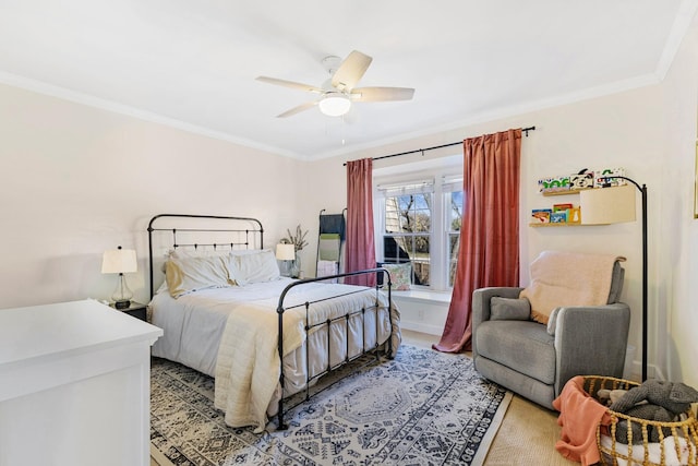 bedroom featuring ceiling fan and ornamental molding