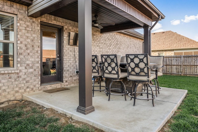 view of patio / terrace featuring ceiling fan