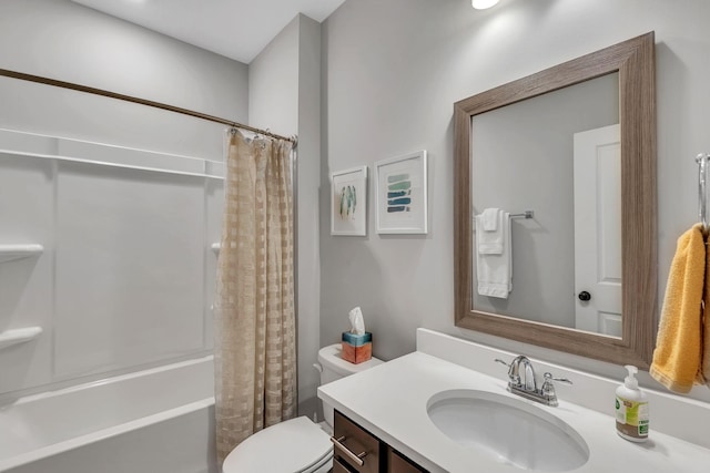 full bathroom with vanity, toilet, and shower / bath combo with shower curtain