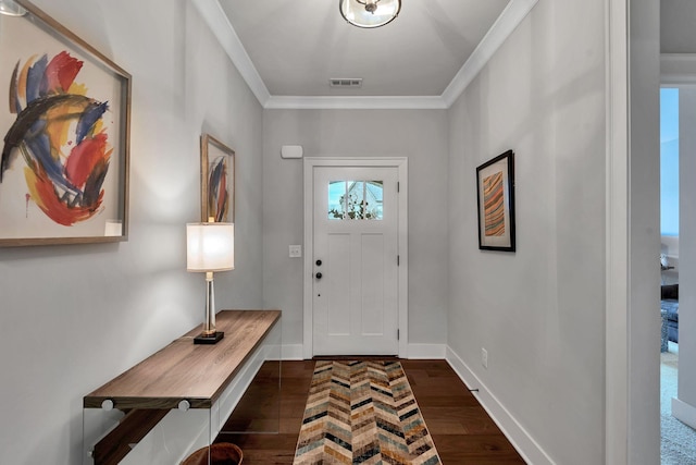 entrance foyer featuring dark hardwood / wood-style floors and ornamental molding