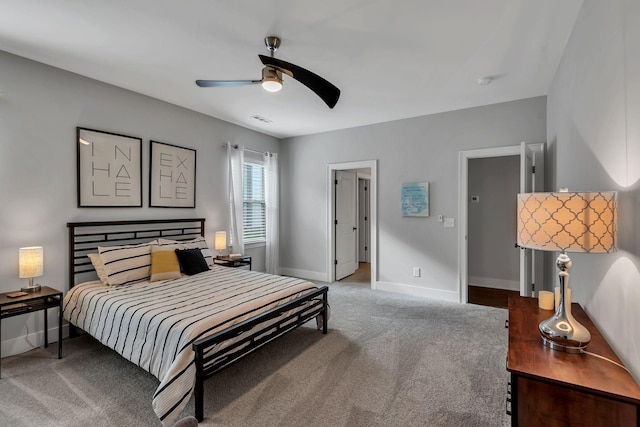 carpeted bedroom featuring ceiling fan