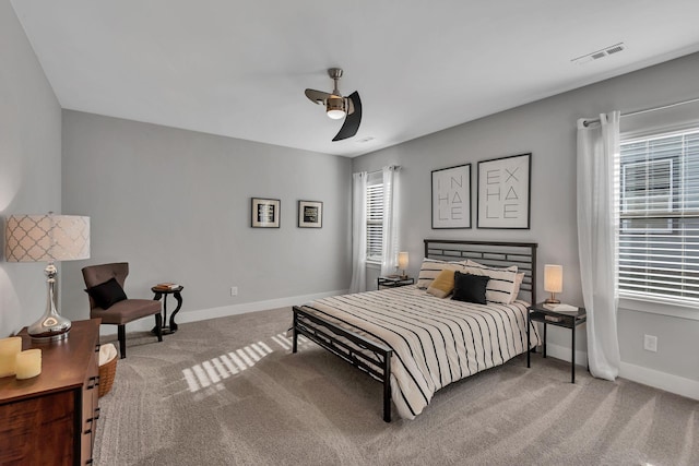 bedroom featuring ceiling fan and carpet floors