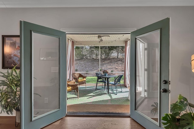 entryway with french doors and hardwood / wood-style flooring