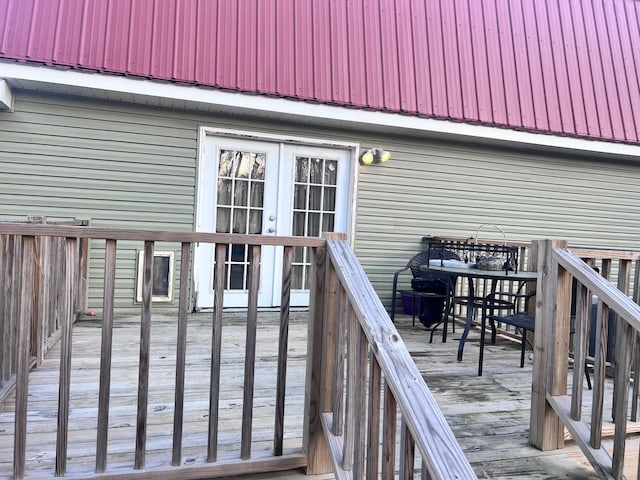 wooden deck featuring french doors