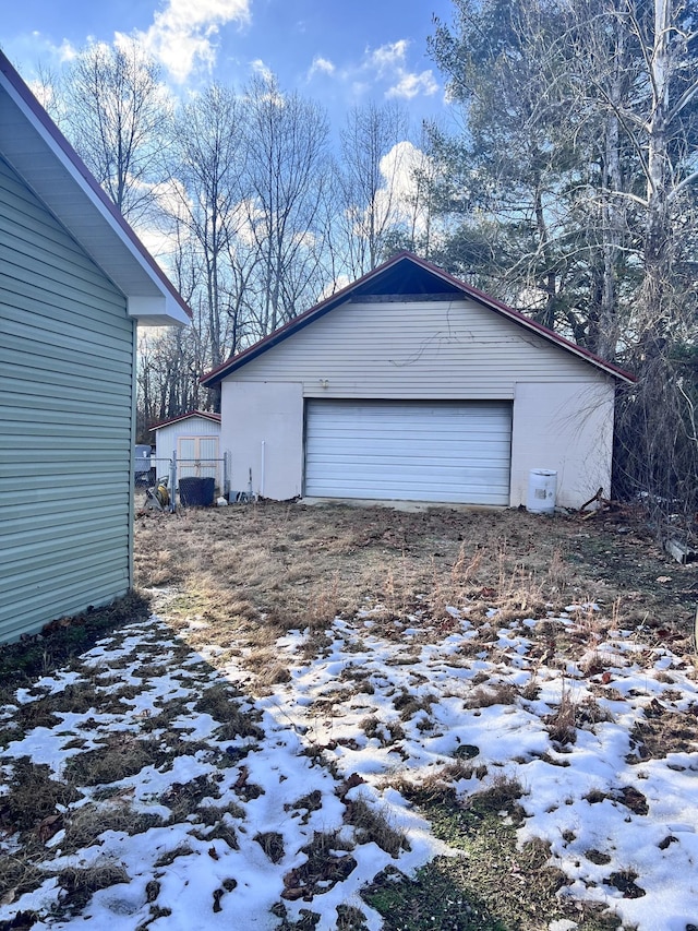 view of snow covered garage