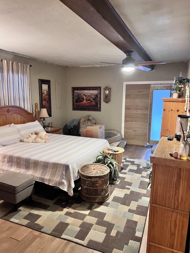 bedroom featuring light hardwood / wood-style flooring and ceiling fan