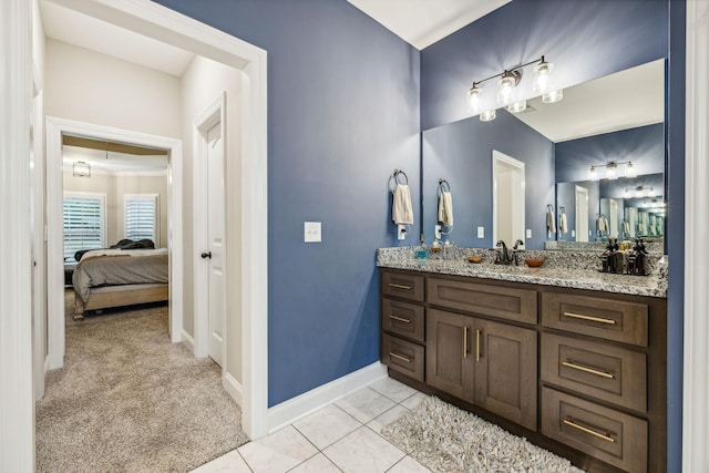 bathroom with tile patterned floors and vanity