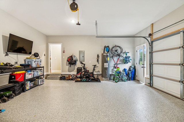 garage featuring electric panel and water heater