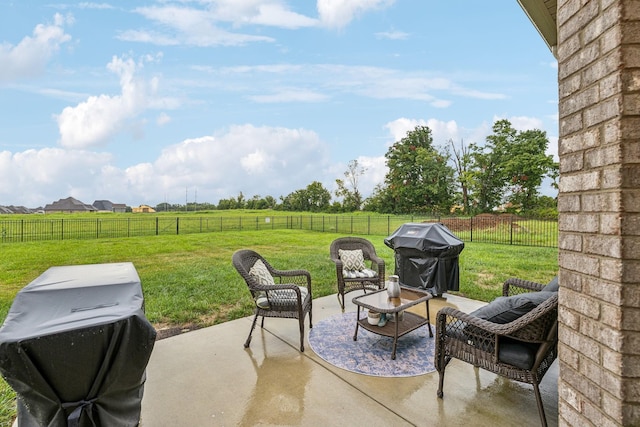 view of patio featuring a grill and a rural view