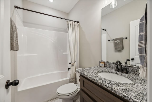 full bathroom featuring shower / tub combo with curtain, vanity, and toilet