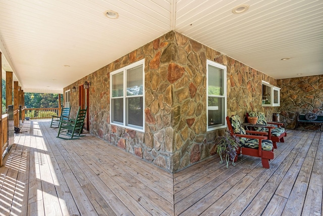 wooden terrace featuring a porch