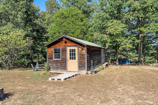 view of outdoor structure with a yard