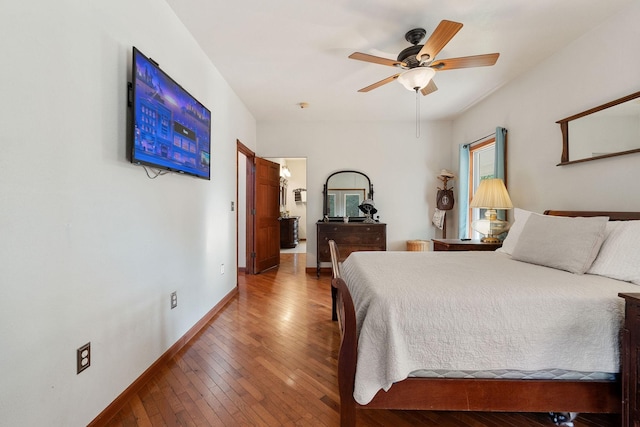 bedroom with ceiling fan and hardwood / wood-style floors