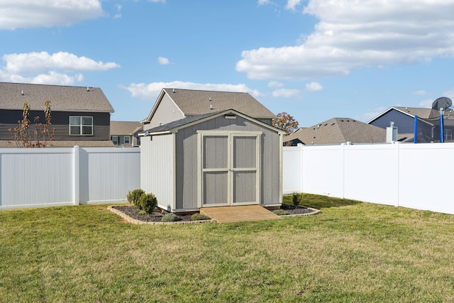 view of outdoor structure with a yard