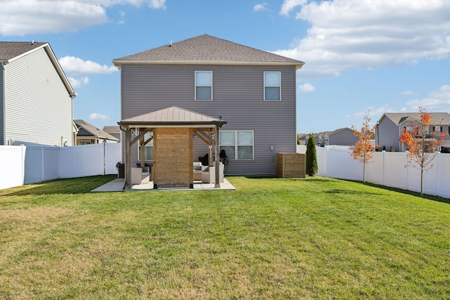 rear view of house featuring a gazebo, a patio area, a yard, and outdoor lounge area