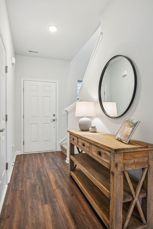 interior space with dark hardwood / wood-style flooring