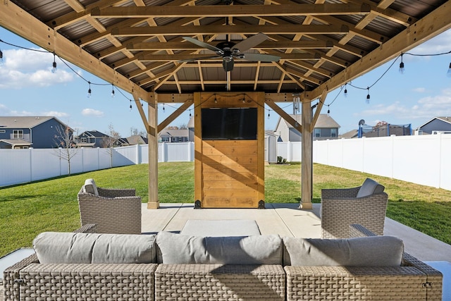 view of patio / terrace featuring a gazebo and ceiling fan