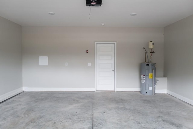 garage with a garage door opener and water heater