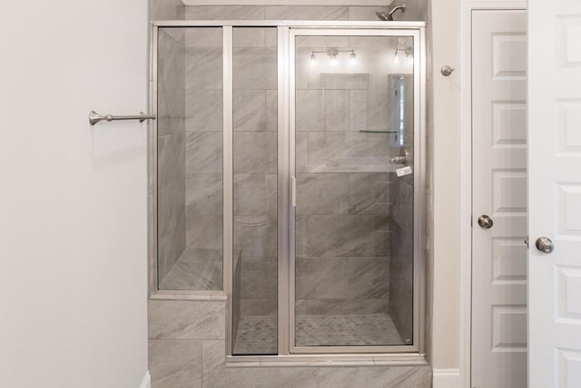 bathroom with an enclosed shower