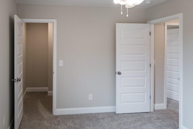 unfurnished bedroom featuring carpet flooring