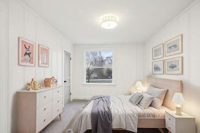 bedroom with light colored carpet and ornamental molding