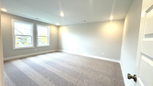 view of carpeted spare room