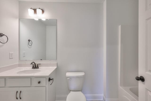 full bathroom featuring vanity, shower / bathtub combination, and toilet