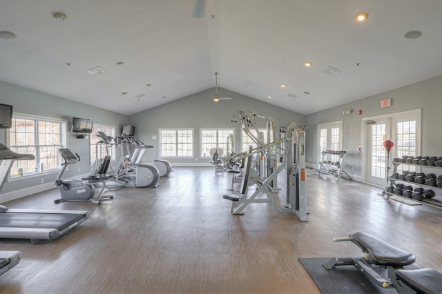 exercise room with a wealth of natural light and vaulted ceiling