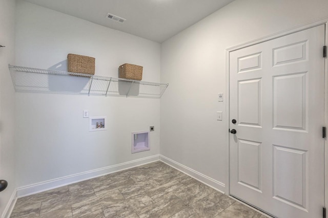 washroom with washer hookup and hookup for an electric dryer