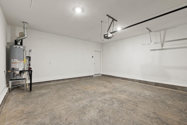 garage featuring a garage door opener and water heater