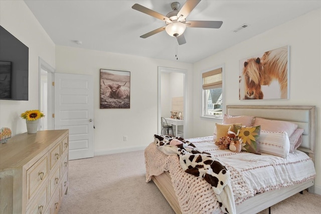 bedroom featuring ceiling fan and light colored carpet