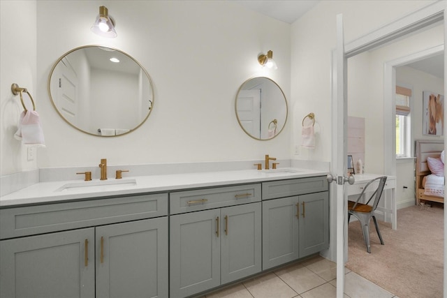 bathroom featuring tile patterned floors and vanity