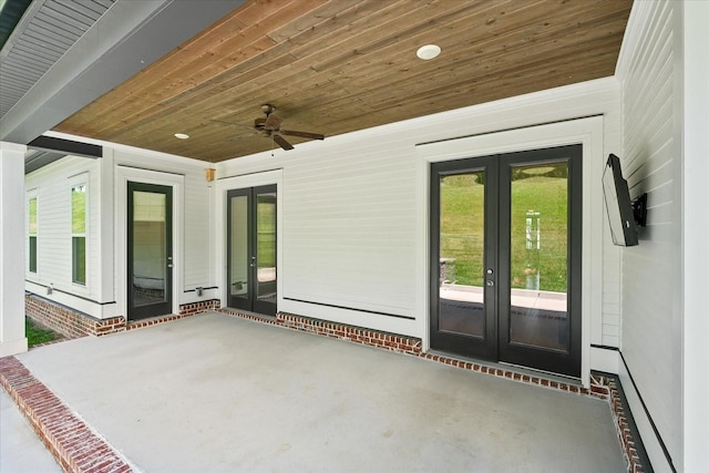 view of patio featuring ceiling fan and french doors