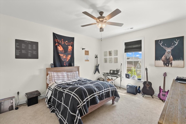 bedroom featuring ceiling fan and carpet floors