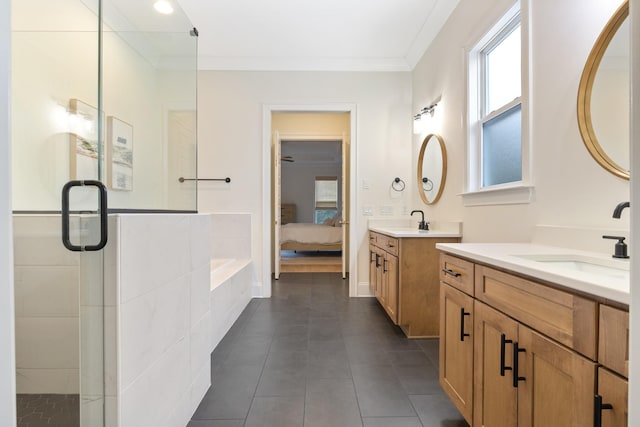 bathroom with tile patterned floors, vanity, crown molding, and separate shower and tub