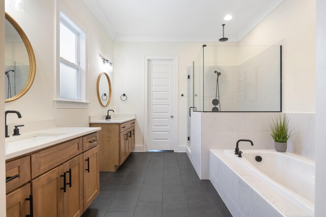 bathroom with independent shower and bath, ornamental molding, tile patterned flooring, and vanity