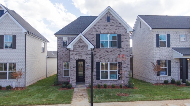 view of front of property with a front lawn