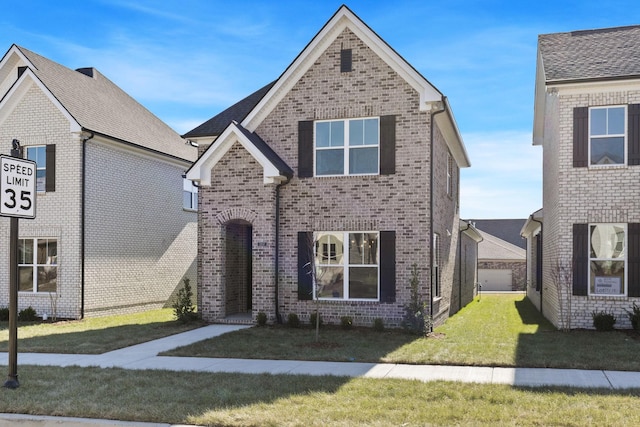 view of front of home with a front lawn