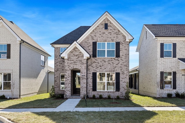 view of front facade with a front lawn