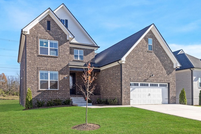 view of front facade with a front yard and a garage