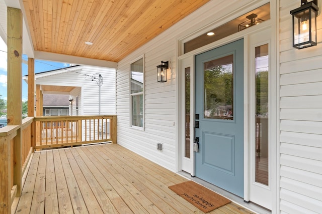 wooden terrace featuring a porch