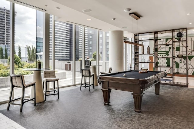 playroom featuring pool table and floor to ceiling windows