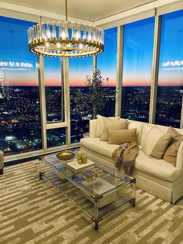 sunroom / solarium with a chandelier