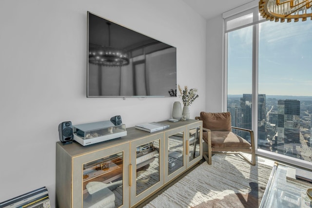 interior space with expansive windows and a healthy amount of sunlight