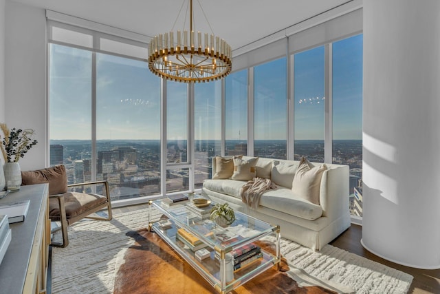 sunroom featuring a chandelier