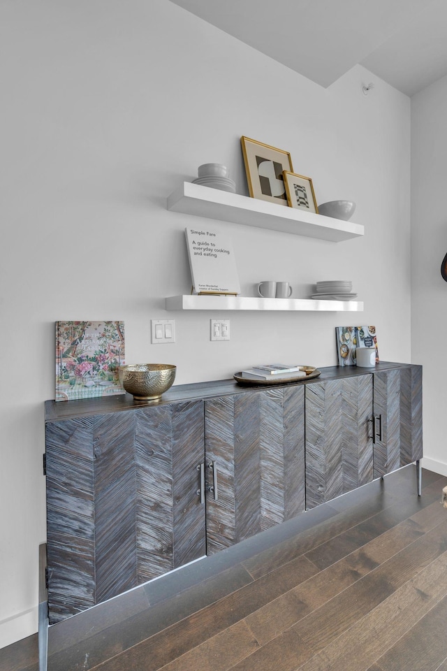 bar featuring dark hardwood / wood-style floors