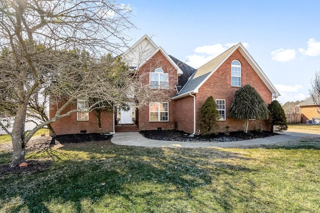 front facade with a front lawn