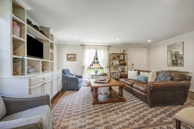 living room featuring crown molding and hardwood / wood-style flooring